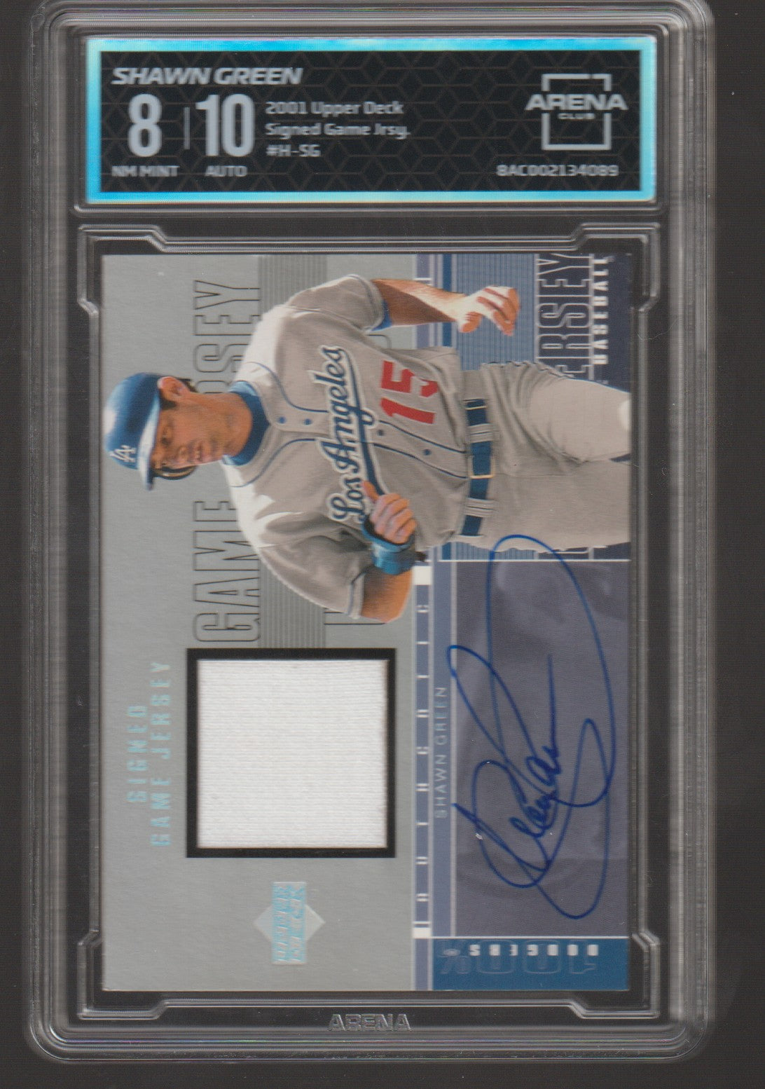 Baseball trading card featuring Shawn Green with autograph and game-used jersey piece, graded by Arena.