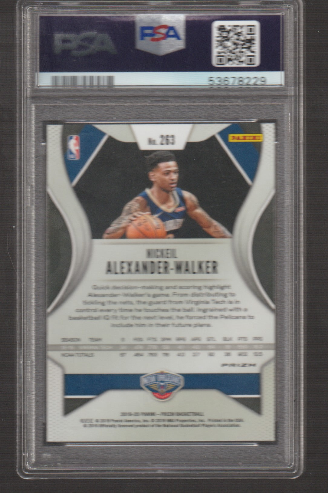 Basketball trading card of a player in a clear protective case with PSA grading label.