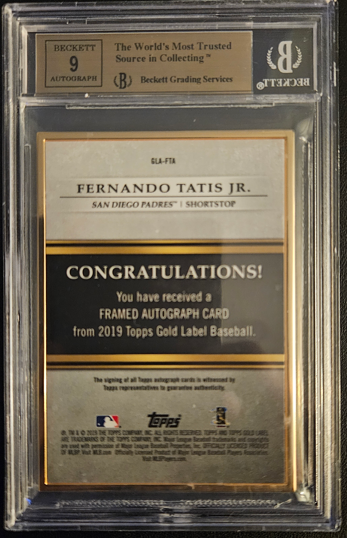 Framed autograph card of Fernando Tatis Jr. with Beckett grading services label