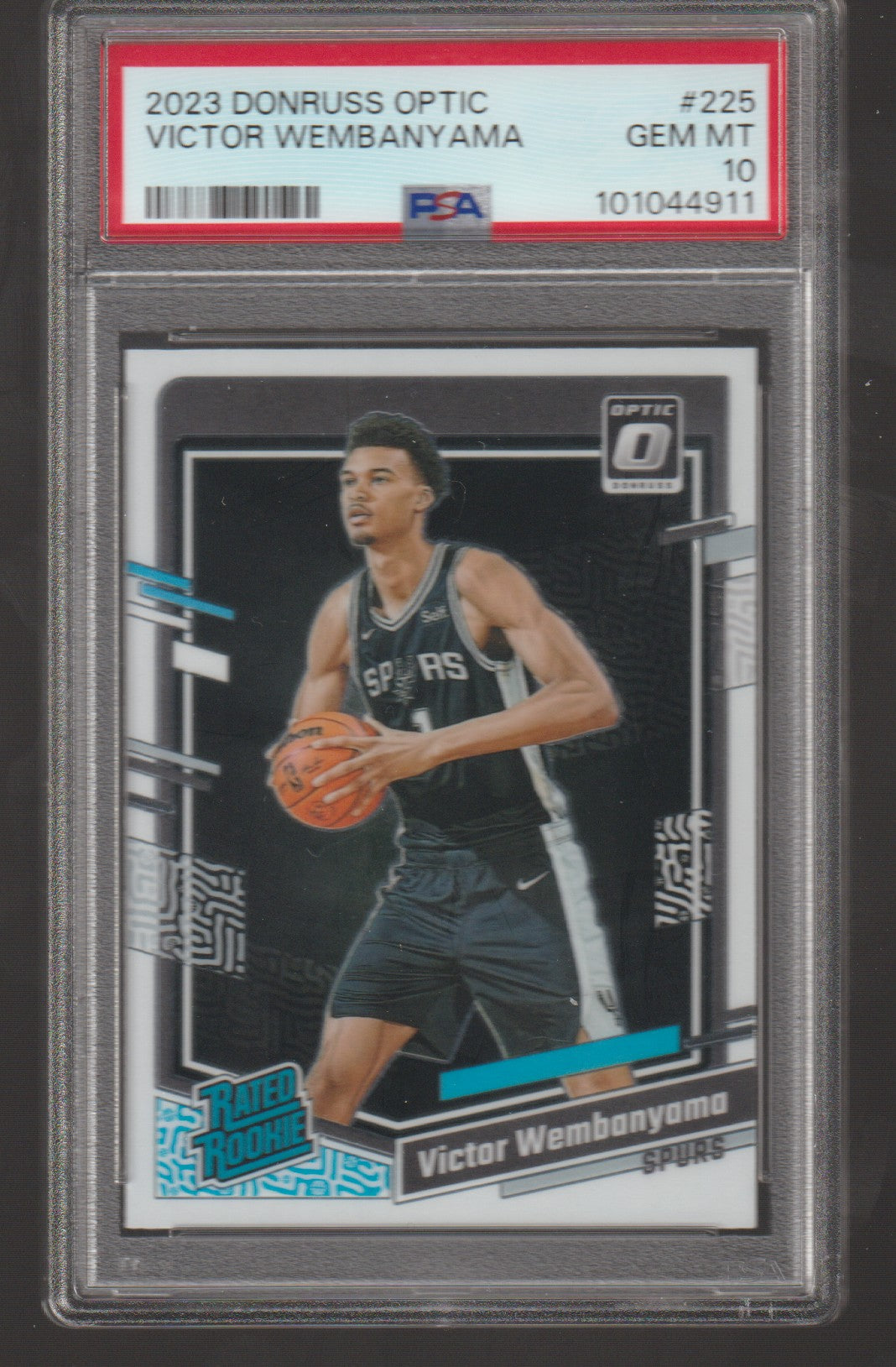 Basketball trading card of Victor Wembanyama in a protective case with PSA grading label.
