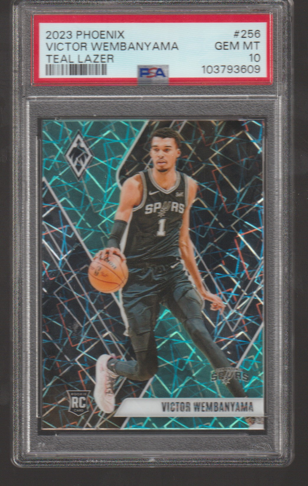 Basketball trading card of Victor Wembanyama with a teal and black design, encased in a protective holder.
