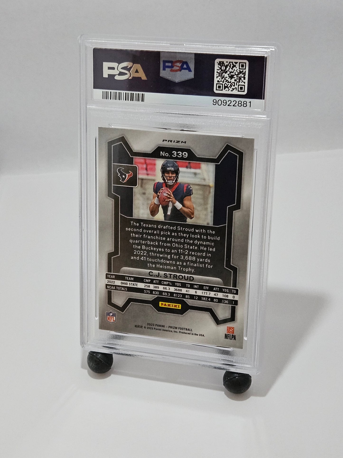 Trading card in a protective case with PSA logo on a white background