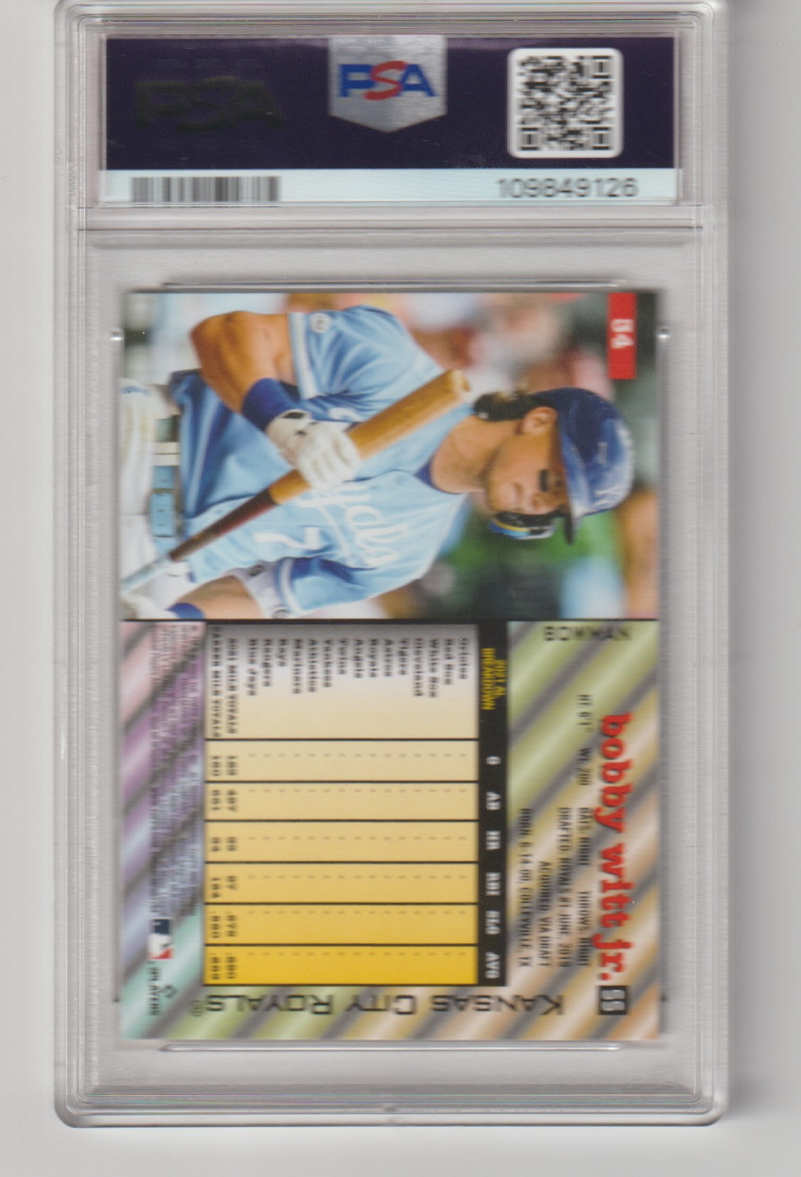 Baseball trading card in a PSA protective case with player image and statistics.