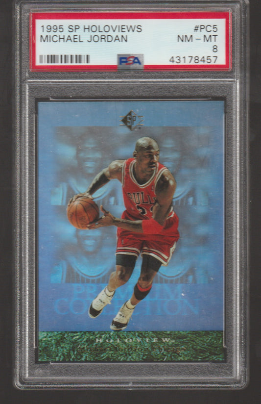 Basketball trading card of Michael Jordan in a red jersey with holographic effect, graded by PSA.