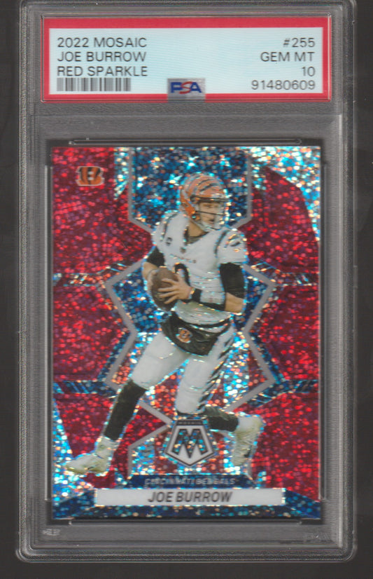 Trading card of Joe Burrow with red and blue sparkles, framed by a PSA grading sleeve.