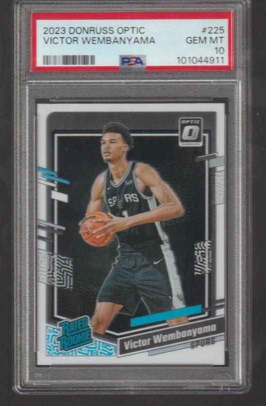 Basketball trading card of Victor Wembanyama in a protective case with PSA grading label.