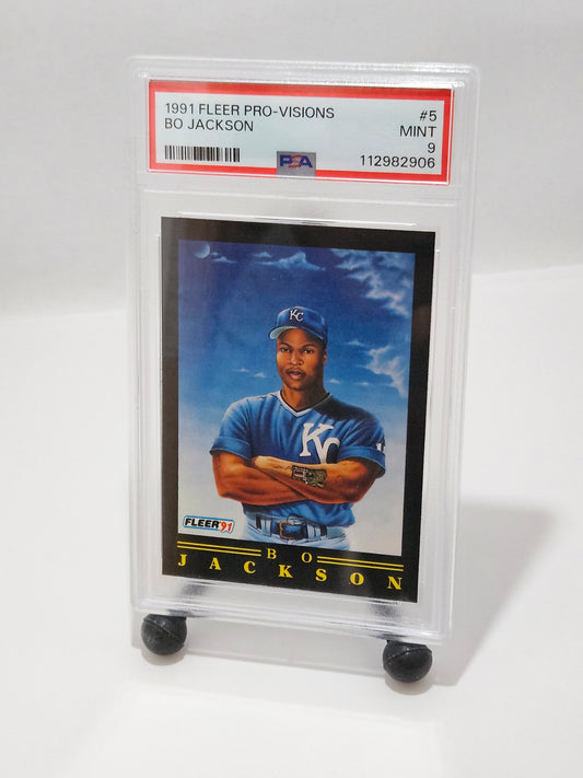 Baseball trading card of Bo Jackson in a blue jersey with a clear protective case on a white background