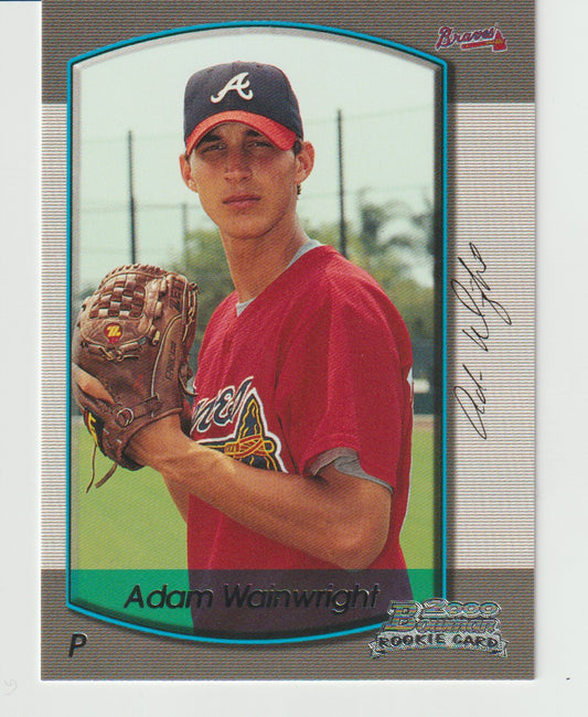 Baseball trading card of Adam Wainwright holding a glove, with a signature on the card.