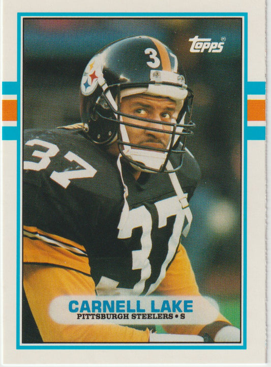 Vintage football trading card of Carnell Lake from the Pittsburgh Steelers with Topps branding.