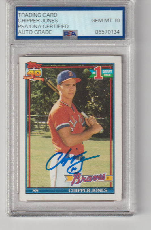 Trading card of Chipper Jones in a protective case with grading information.