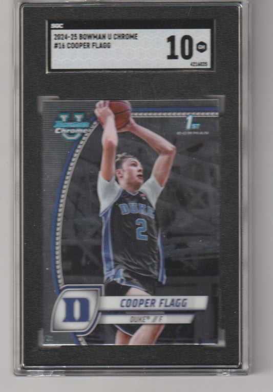 Basketball trading card of Cooper Flagg in a Duke jersey, encased in protective packaging.