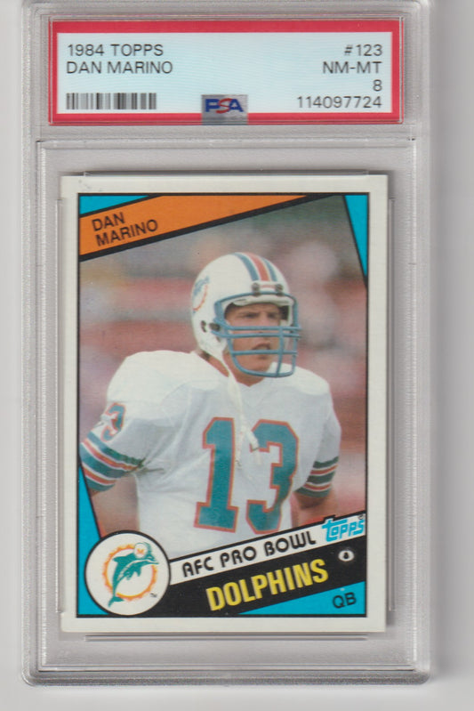 1984 Topps Dan Marino football trading card in a protective case with PSA grading label.