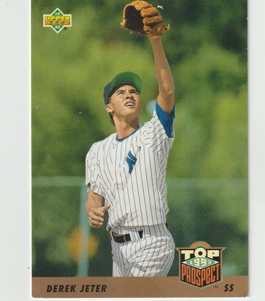 Baseball trading card of Derek Jeter in a pinstripe uniform with a glove, on a green field background.