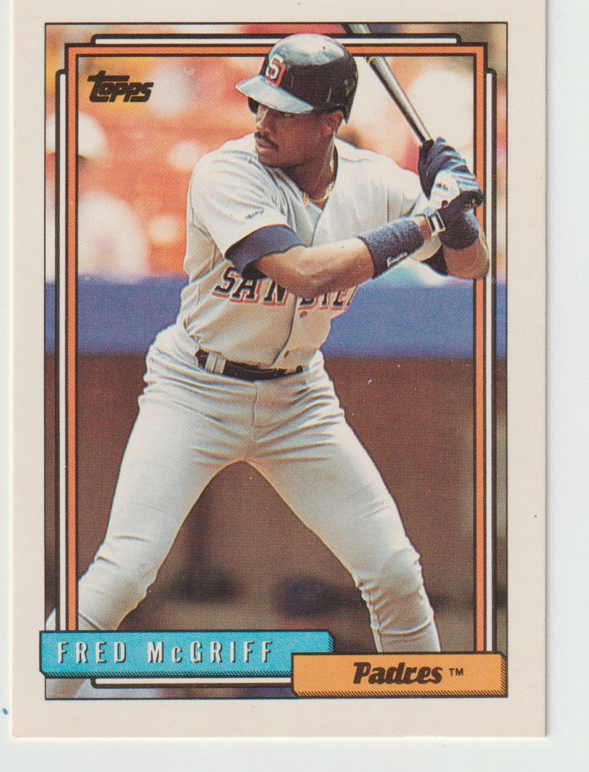 Baseball trading card of Fred McGriff in a batting pose, with 'Topps' branding.