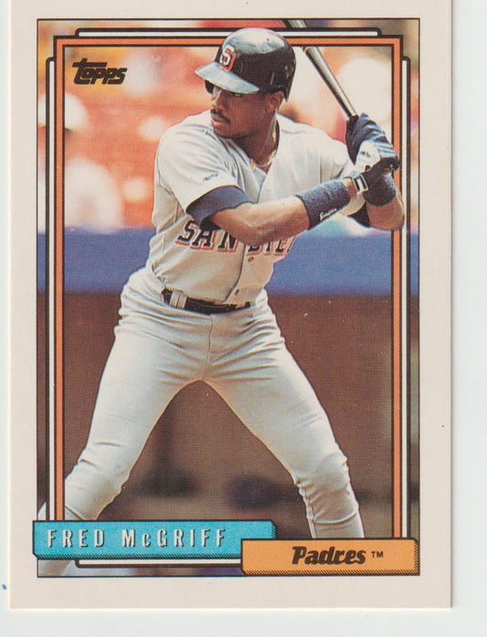 Baseball trading card of Fred McGriff in a batting pose, with 'Topps' branding.