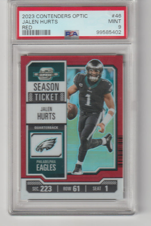 Football trading card of Jalen Hurts in a protective case with grading information.
