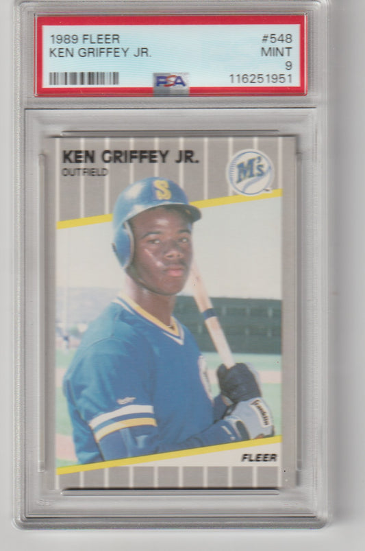 Baseball trading card of Ken Griffey Jr. in a protective case with grading information.