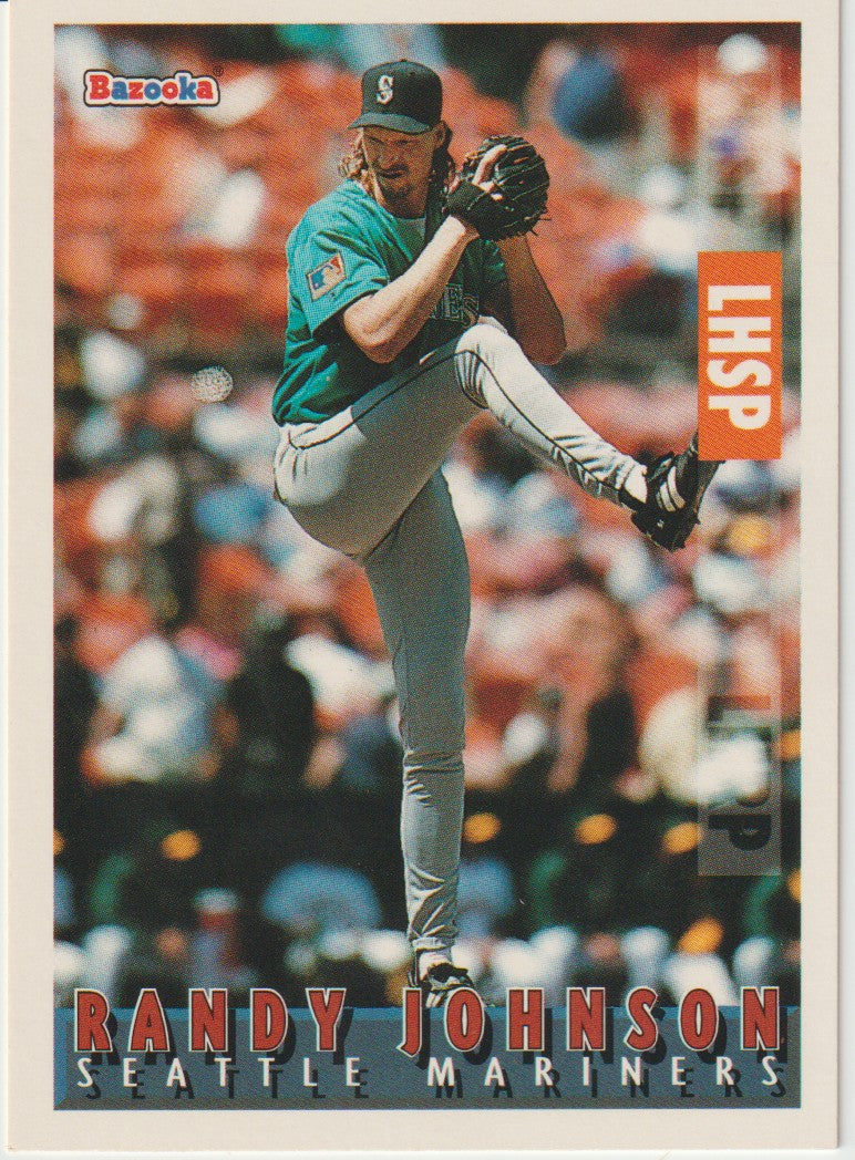 Baseball trading card of Randy Johnson for the Seattle Mariners with a blurred crowd in the background.