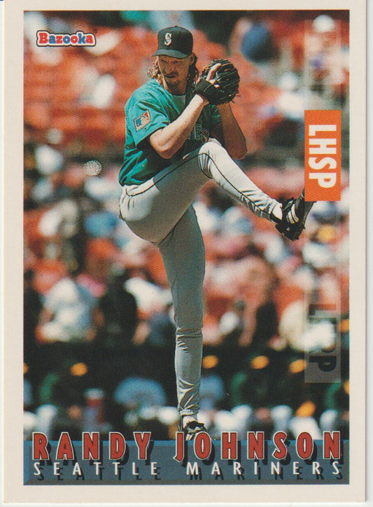 Baseball trading card of Randy Johnson for the Seattle Mariners with a blurred crowd in the background.