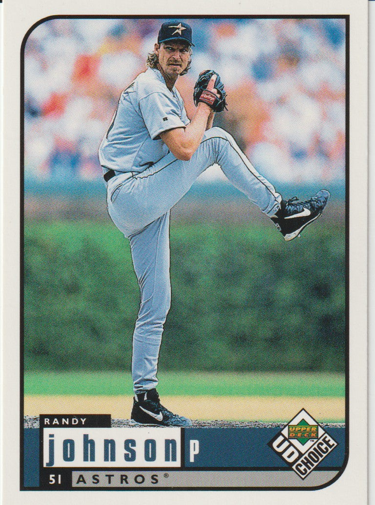 Baseball trading card of a pitcher in a light blue uniform with a blurred crowd in the background.
